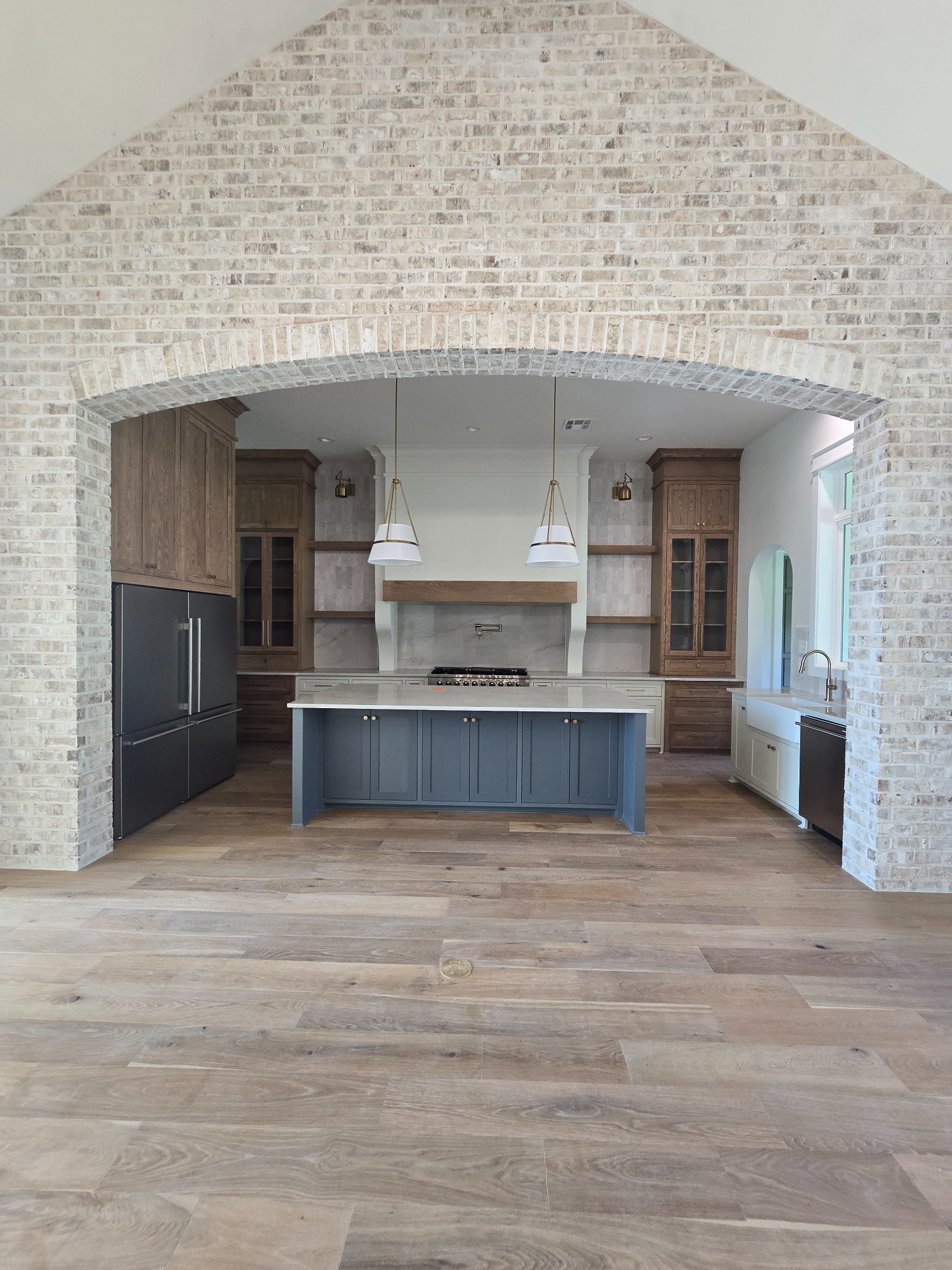 Kitchen with arch and brick detailing