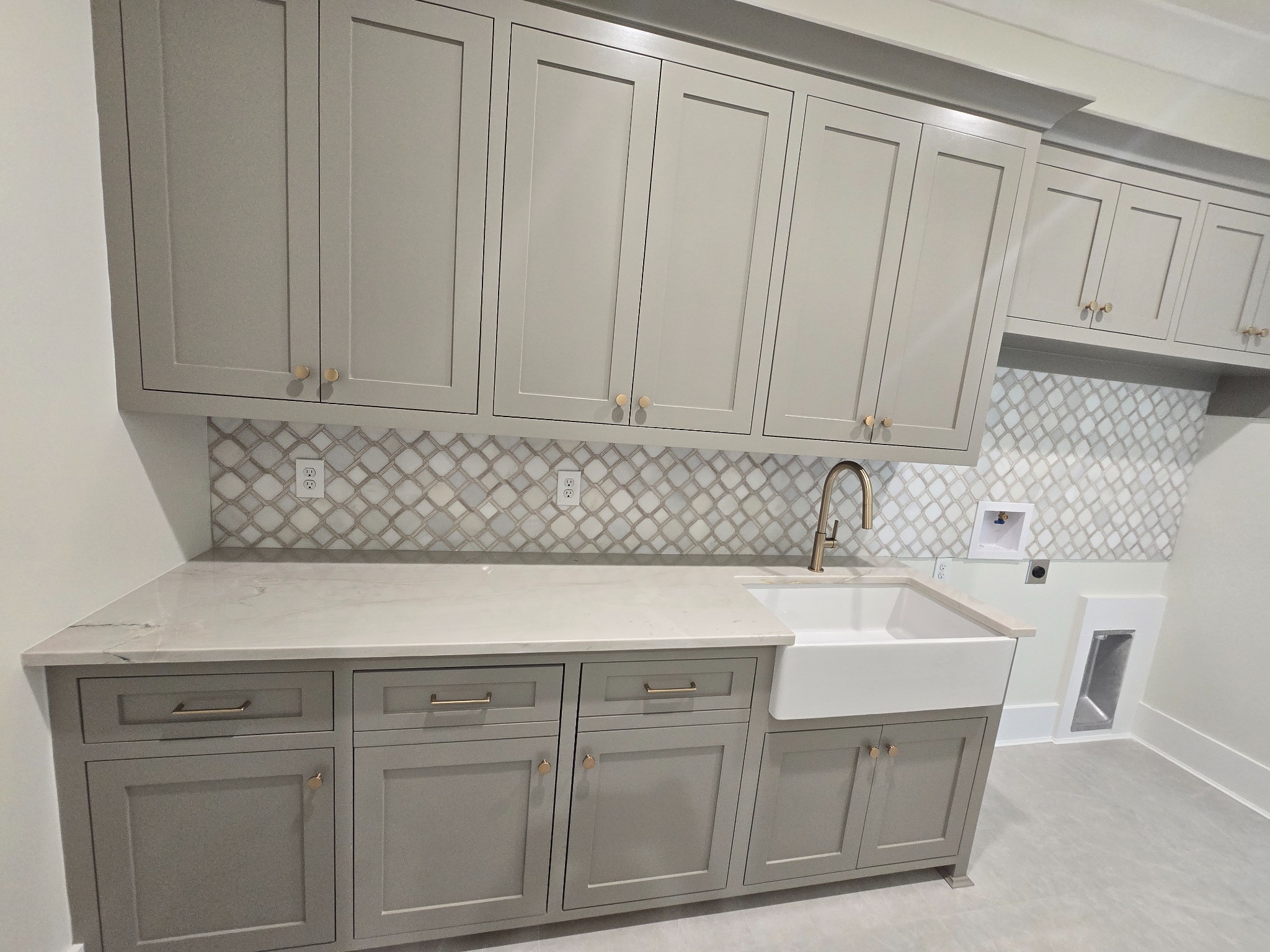 Laundry room cabinetry painted